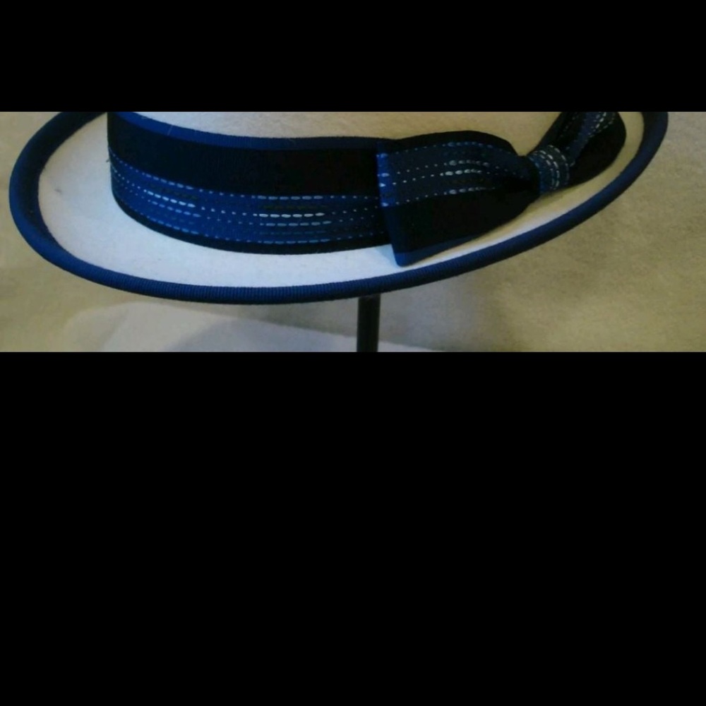 From celebrity hat designer Rod Keenan beautiful striking blue ribbon .
